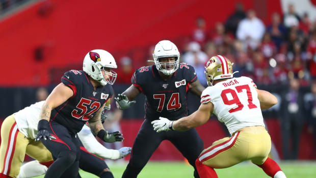 Arizona Cardinals center Mason Cole (52) and offensive tackle D.J. Humphries (74) against San Francisco 49ers defensive end Nick Bosa (97) at State Farm Stadium.