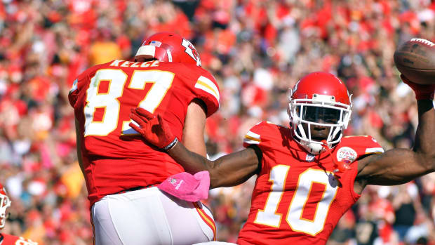 Oct 23, 2016; Kansas City, MO, USA; Kansas City Chiefs wide receiver Tyreek Hill (10) and tight end Travis Kelce (87) celebrate after Hill's touchdown during the first half against the New Orleans Saints at Arrowhead Stadium. Mandatory Credit: Denny Medley-USA TODAY Sports
