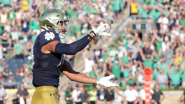 Notre Dame safety Kyle Hamilton (14) celebrates an interception during the fourth quarter of an NCAA football game, Saturday, Sept. 18, 2021 at Notre Dame Stadium in South Bend.
