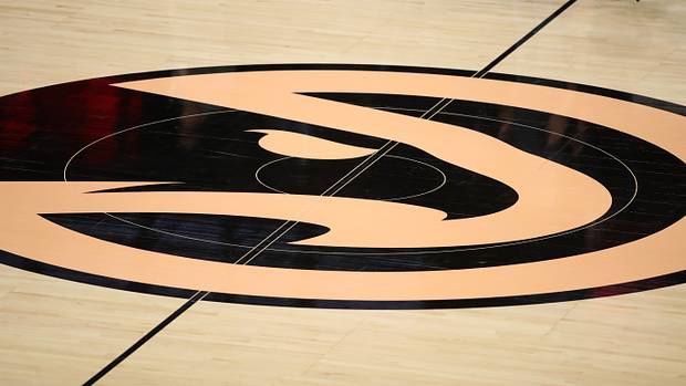 A general view of the Atlanta Hawks logo at midcourt before a game between the Hawks and the Milwaukee Bucks at State Farm Arena.