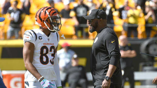 Sep 19, 2021; Pittsburgh, Pennsylvania, USA; Cincinnati Bengals wide receiver Tyler Boyd (left) meets with Pittsburgh Steelers head coach Mike Tomlin before their game at Heinz Field. Mandatory Credit: Philip G. Pavely-USA TODAY Sports
