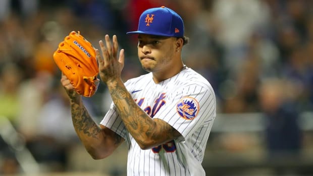 Sep 29, 2021; New York City, New York, USA; New York Mets starting pitcher Taijuan Walker (99) claps as he leaves the game against the Miami Marlins during the eighth inning at Citi Field.