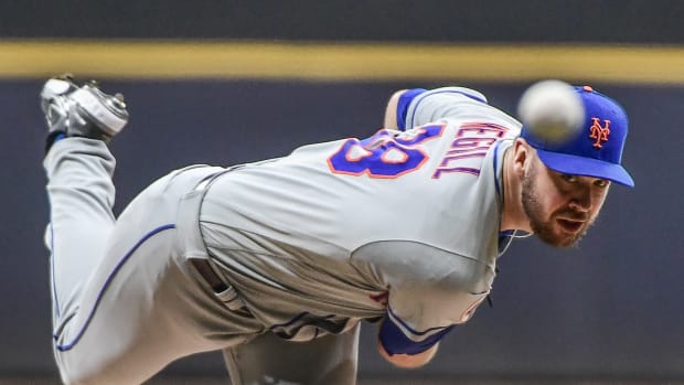 Sep 24, 2021; Milwaukee, Wisconsin, USA; New York Mets pitcher Tylor Megill (38) throws a pitch in the first inning against the Milwaukee Brewers at American Family Field.
