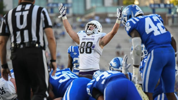 Sep 18, 2021; Durham, North Carolina, USA; Northwestern Wildcats tight end Marshall Lang (88) celebrates a touchdown during the third quarter at Wallace Wade Stadium. Mandatory Credit: William Howard-USA TODAY Sports