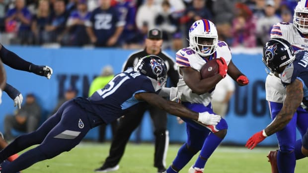 Bills running back Devin Singletary (26) runs for a first down during the first half against the Tennessee Titans at Nissan Stadium.