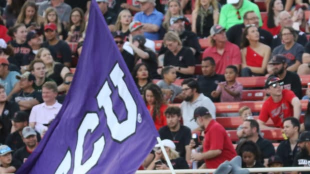 SuperFrog cheers on the TCU Horned Frogs at the Texas Tech football game on October 9, 2021