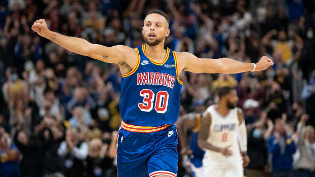 Golden State Warriors guard Stephen Curry celebrates against the LA Clippers during the fourth quarter at Chase Center.