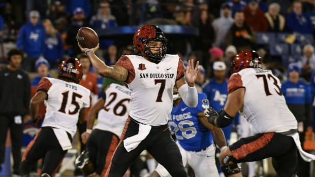Oct 23, 2021; Colorado Springs, Colorado, USA; San Diego State Aztecs quarterback Lucas Johnson (7) throws a pass down field against the Air Force Falcons during the fourth quarter at Falcon Stadium. Mandatory Credit: John Leyba-USA TODAY Sports