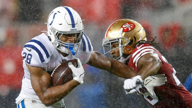 Indianapolis Colts running back Jonathan Taylor (28) fends off San Francisco 49ers cornerback Josh Norman (26) during the first half of the game Sunday, Oct. 24, 2021, at Levi's Stadium in Santa Clara, Calif.

Indianapolis Colts Visit The San Francisco 49ers For Nfl Week 7 At Levi S Stadium In Santa Clara Calif Sunday Oct 24 2021