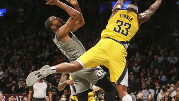 Oct 29, 2021; Brooklyn, New York, USA; Brooklyn Nets forward Kevin Durant (7) is fouled putting up a shot by Indiana Pacers forward Myles Turner (33)	in the fourth quarter at Barclays Center. Mandatory Credit: Wendell Cruz-USA TODAY Sports