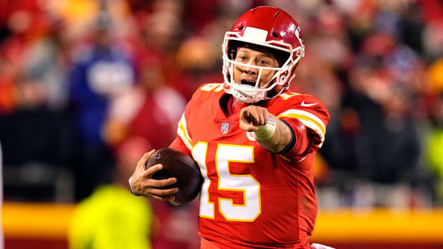 Patrick Mahomes directs a blocker while running during the Chiefs' Monday night win over the Giants