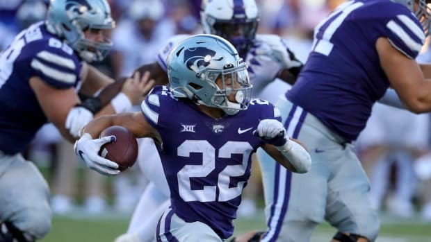 Oct 30, 2021; Manhattan, Kansas, USA; Kansas State Wildcats running back Deuce Vaughn (22) finds room to run during the fourth quarter against the TCU Horned Frogs at Bill Snyder Family Football Stadium. Mandatory Credit: Scott Sewell-USA TODAY Sports