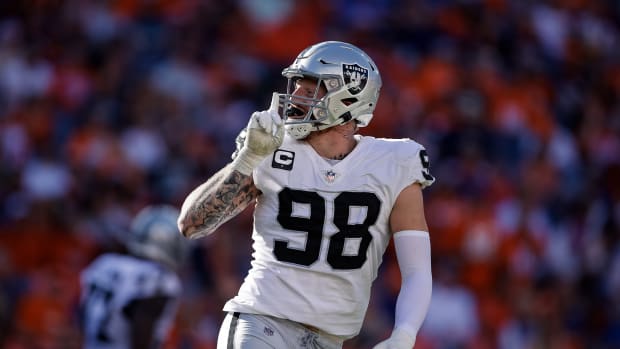 Oct 17, 2021; Denver, Colorado, USA; Las Vegas Raiders defensive end Maxx Crosby (98) reacts after a play in the second quarter against the Denver Broncos at Empower Field at Mile High.