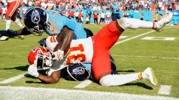 Kansas City Chiefs running back Darrel Williams (31) is stopped by Tennessee Titans linebacker David Long (51) during the fourth quarter at Nissan Stadium Sunday, Oct. 24, 2021 in Nashville, Tenn.

Titans Chiefs 187