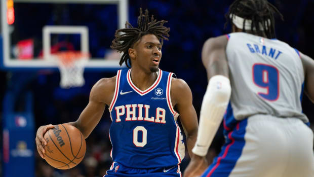 Oct 28, 2021; Philadelphia, Pennsylvania, USA; Philadelphia 76ers guard Tyrese Maxey (0) dribbles the ball in front of Detroit Pistons forward Jerami Grant (9) during the third quarter at Wells Fargo Center. Mandatory Credit: Bill Streicher-USA TODAY Sports