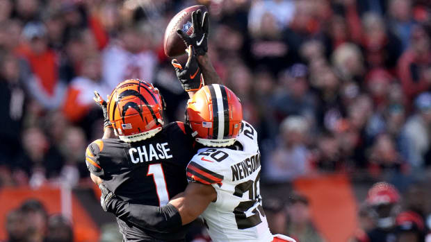 Cleveland Browns cornerback Greg Newsome II (20) breaks up a pass intended for Cincinnati Bengals wide receiver Ja'Marr Chase (1) in the first quarter during a Week 9 NFL football game, Sunday, Nov. 7, 2021, at Paul Brown Stadium in Cincinnati. The Cleveland Browns lead the Cincinnati Bengals 24-10 at halftime. Cleveland Browns At Cincinnati Bengals Nov 7