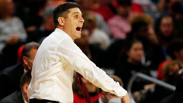 Cincinnati Bearcats head coach Wes Miller shouts from the sideline in the second half of the NCAA basketball game between the Cincinnati Bearcats and the Evansville Aces at Fifth Third Arena in Cincinnati on Tuesday, Nov. 9, 2021. The Bearcats collected a season-opening win over the Aces, 65-43. Evansville Aces At Cincinnati Bearcats