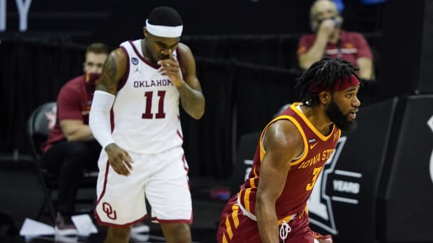 Mar 10, 2021; Kansas City, MO, USA; Iowa State Cyclones guard Tre Jackson (3) celebrates after scoring against Oklahoma Sooners guard De'Vion Harmon (11) during the second half at T-Mobile Center. Mandatory Credit: Jay Biggerstaff-USA TODAY Sports