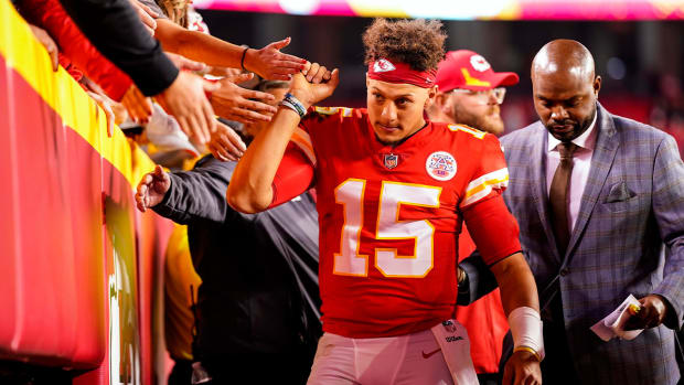 Nov 7, 2021; Kansas City, Missouri, USA; Kansas City Chiefs quarterback Patrick Mahomes (15) greets fans as he leaves the field after the game against the Green Bay Packers at GEHA Field at Arrowhead Stadium.