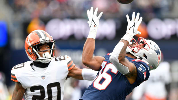 Nov 14, 2021; Foxborough, Massachusetts, USA; New England Patriots wide receiver Jakobi Meyers (16) makes a catch on a pass from quarterback Mac Jones (not seen) in front of Cleveland Browns cornerback Greg Newsome II (20) during the first half at Gillette Stadium. Mandatory Credit: Brian Fluharty-USA TODAY Sports