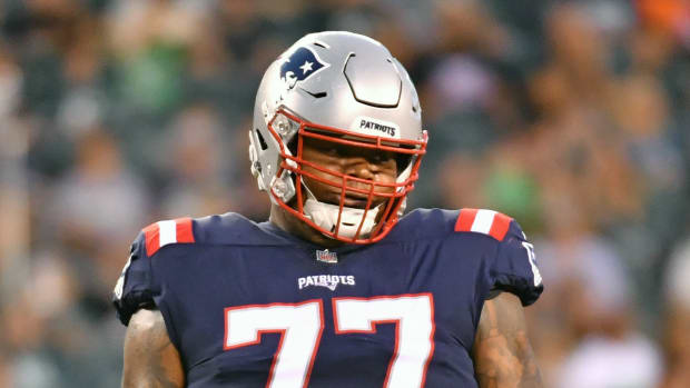 Patriots lineman Trent Brown plays in a game.