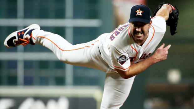 Oct 23, 2019; Houston, TX, USA; Houston Astros starting pitcher Justin Verlander (35) throws against the Washington Nationals during the first inning of game two of the 2019 World Series at Minute Maid Park.