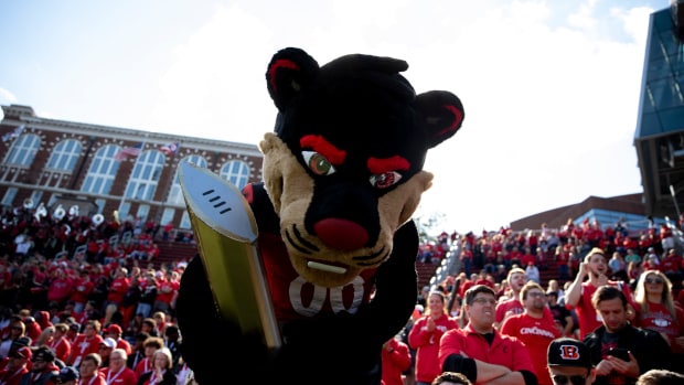Cincinnati Bearcats mascot holds a cardboard version of the National Championship trophy in the second half of the NCAA football game on Saturday, Oct. 15, 2021, at Nippert Stadium in Cincinnati. Cincinnati Bearcats defeated UCF Knights 56-21. Ucf Knights At Cincinnati Bearcats 164