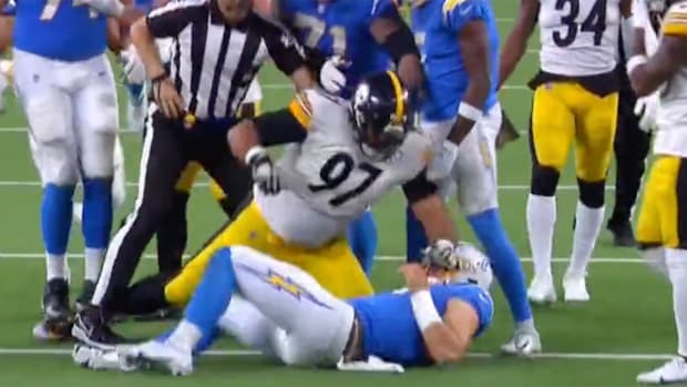 Cameron Heyward on top of Justin Herbert.