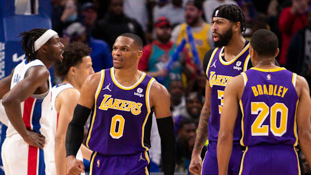 Lakers guard Russell Westbrook (0) and forward Anthony Davis (3) react after a play.