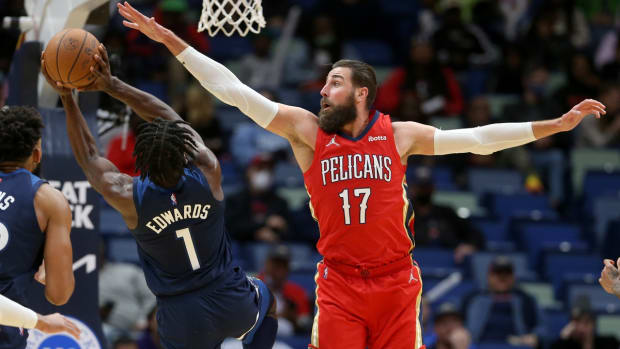 Nov 22, 2021; New Orleans, Louisiana, USA; New Orleans Pelicans center Jonas Valanciunas (17) defends Minnesota Timberwolves forward Anthony Edwards (1) in the second half at the Smoothie King Center. Mandatory Credit: Chuck Cook-USA TODAY Sports