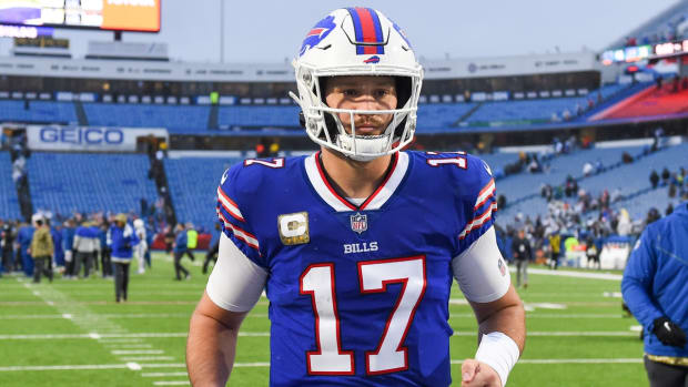 Nov 21, 2021; Orchard Park, New York, USA; Buffalo Bills quarterback Josh Allen (17) jogs off the field following the game against the Indianapolis Colts at Highmark Stadium. Mandatory Credit: Rich Barnes-USA TODAY Sports