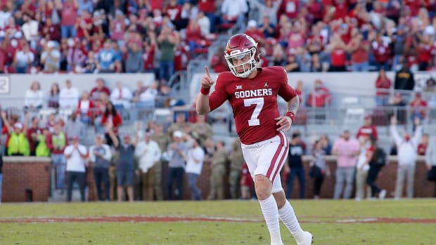 Oklahoma's Spencer Rattler reacts after throwing a touchdown against Texas Tech. Syndication The Oklahoman