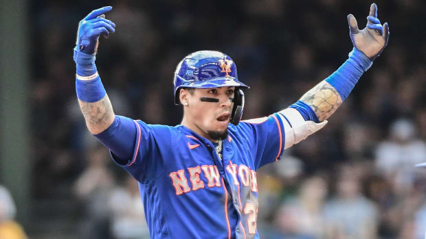 New York Mets shortstop Javier Baez (23) reacts after hitting a double to drive in 2 runs in the fourth inning against the Milwaukee Brewers at American Family Field.
