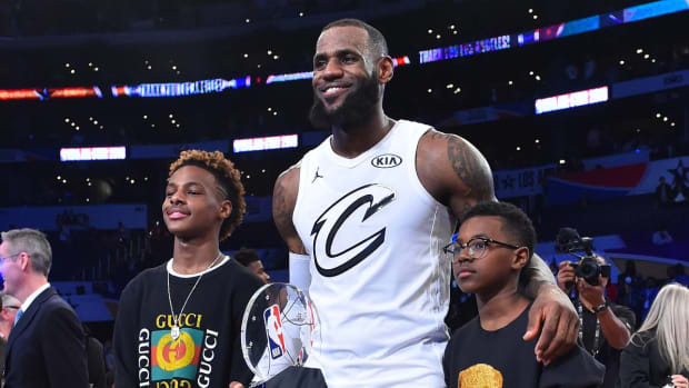LeBron James with sons Bronny and Bryce James.