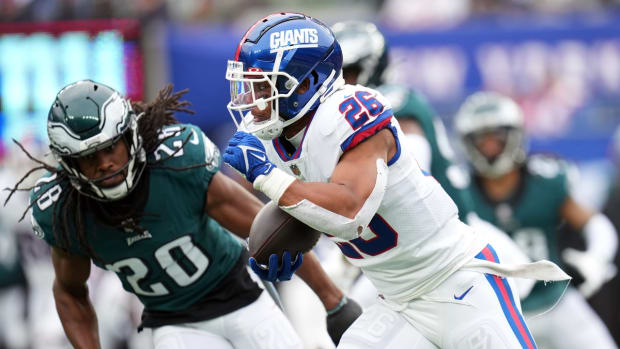 New York Giants running back Saquon Barkley (26) rushes against the Philadelphia Eagles in the first half. The Giants defeat the Eagles, 13-7, at MetLife Stadium on Sunday, Nov. 28, 2021, in East Rutherford.

Nyg Vs Phi