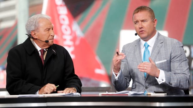 Lee Corso (left) and Kirk Herbstreit record a segment of College GameDay on Saturday, Nov. 2, 2019, on Beale Street in downtown Memphis.