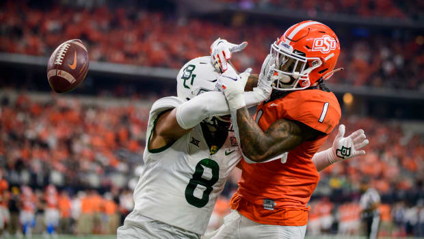 Dec 4, 2021; Arlington, TX, USA; Baylor Bears safety Jalen Pitre (8) breaks up a pass intended for Oklahoma State Cowboys wide receiver Tay Martin (1) during the second quarter in the Big 12 Conference championship game at AT&T Stadium. Mandatory Credit: Jerome Miron-USA TODAY Sports