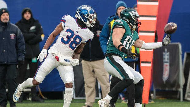 Nov 28, 2021; East Rutherford, New Jersey, USA; Philadelphia Eagles tight end Dallas Goedert (88) can not secure a pass as New York Giants defensive back Steven Parker (38) defends during the second half at MetLife Stadium.