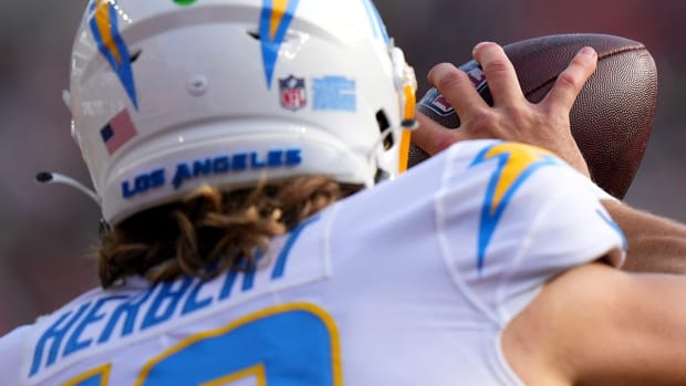 Los Angeles Chargers quarterback Justin Herbert (10) catches a pass for a two-point conversion in the second quarter during a Week 13 NFL football game against the Cincinnati Bengals, Sunday, Dec. 5, 2021, at Paul Brown Stadium in Cincinnati.