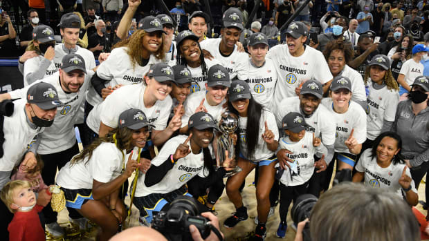 The Chicago Sky team with the championship trophy after the Chicago Sky beat the Phoenix Mercury 80-74 in game four of the 2021 WNBA Finals at Wintrust Arena.