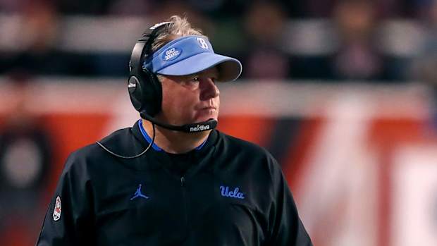 Oct 30, 2021; Salt Lake City, Utah, USA; UCLA Bruins head coach Chip Kelly watches from the sideline during the fourth quarter against the Utah Utes at Rice-Eccles Stadium.