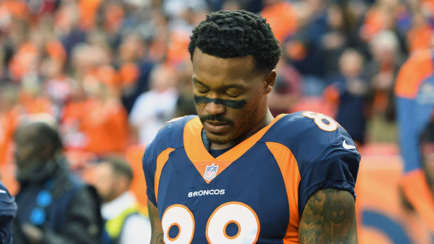 Denver Broncos wide receiver Demaryius Thomas (88) reacts during the national anthem before a game against the Kansas City Chiefs at Broncos Stadium at Mile High.