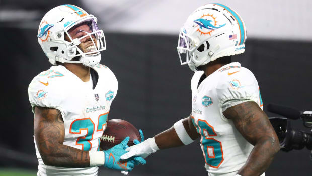 Myles Gaskin and Salvon Ahmed remain teammates in Miami.