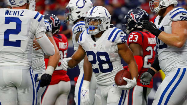 Indianapolis Colts running back Jonathan Taylor (28) celebrates after scoring a touchdown during the third quarter of the game Sunday, Dec. 5, 2021, at NRG Stadium in Houston. Indianapolis Colts Versus Houston Texans On Sunday Dec 5 2021 At Nrg Stadium In Houston Texas.