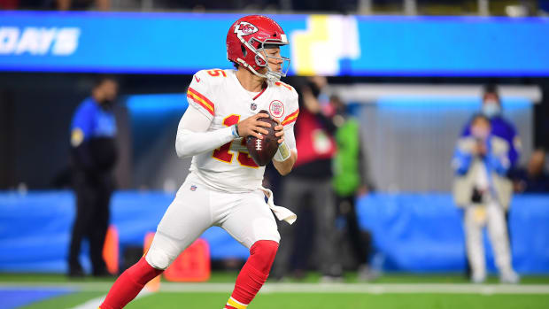 Dec 16, 2021; Inglewood, California, USA; Kansas City Chiefs quarterback Patrick Mahomes (15) drops back to pass against the Los Angeles Chargers during the first half at SoFi Stadium. Mandatory Credit: Gary A. Vasquez-USA TODAY Sports