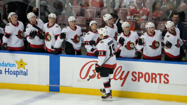 Dec 14, 2021; Sunrise, Florida, USA; Ottawa Senators right wing Drake Batherson (19) celebrates his goal against the Florida Panthers with teammates on the bench during the third period at FLA Live Arena. Mandatory Credit: Jasen Vinlove-USA TODAY Sports