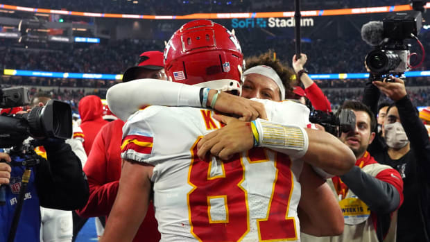 Dec 16, 2021; Inglewood, California, USA; Kansas City Chiefs tight end Travis Kelce (87) celebrates with quarterback Patrick Mahomes (15) after scoring a touchdown in overtime against the Los Angeles Chargers at SoFi Stadium. Mandatory Credit: Kirby Lee-USA TODAY Sports