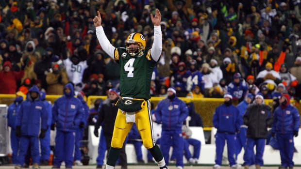 Jan 20, 2008; Green Bay, WI, USA; Green Bay Packers quarterback Brett Favre (4) celebrates a touchdown pass during the third quarter of the NFC championship game against the New York Giants at Lambeau Field.
