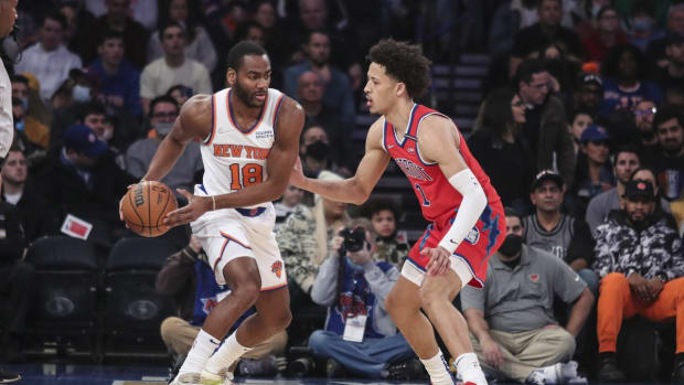 Dec 21, 2021; New York, New York, USA; New York Knicks guard Alec Burks (18) is guarded by Detroit Pistons guard Cade Cunningham (2) in the first quarter at Madison Square Garden. Mandatory Credit: Wendell Cruz-USA TODAY Sports