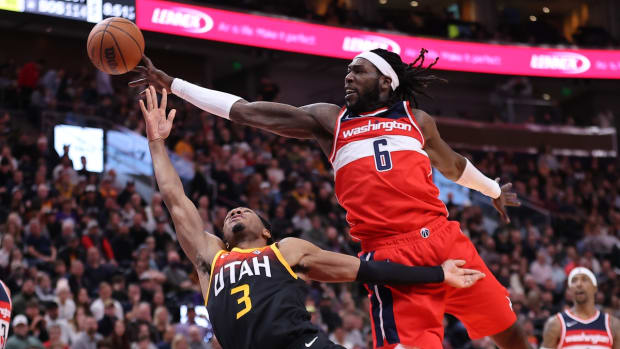 Dec 18, 2021; Salt Lake City, Utah, USA; Washington Wizards center Montrezl Harrell (6) block the shot of Utah Jazz guard Trent Forrest (3) but is called for a foul in the third quarter at Vivint Arena. Mandatory Credit: Rob Gray-USA TODAY Sports